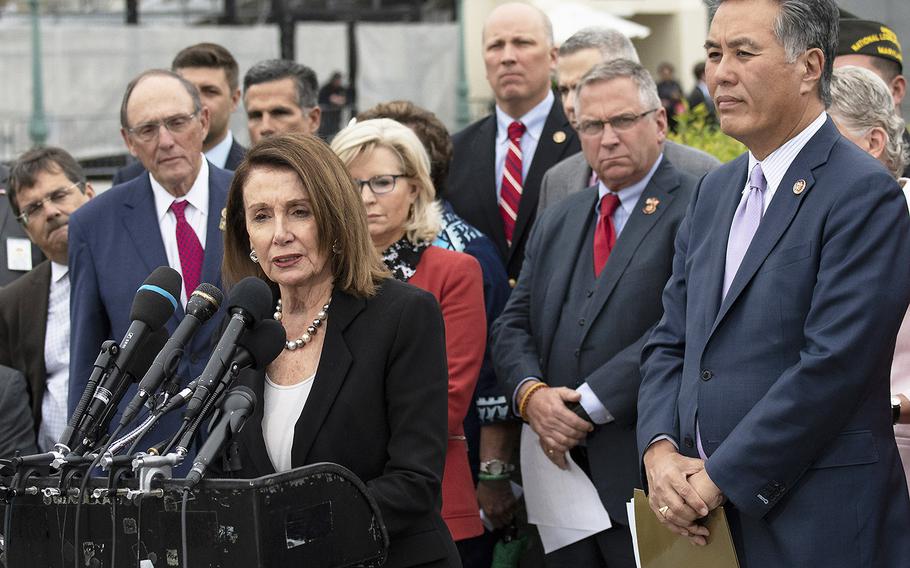 House Speaker Nancy Pelosi, D-Calif, speaks at a Capitol Hill press conference on veteran suicide, April 29, 2019. At right is House Veterans' Affairs Committee Chairman Mark Takano, D-Calif.