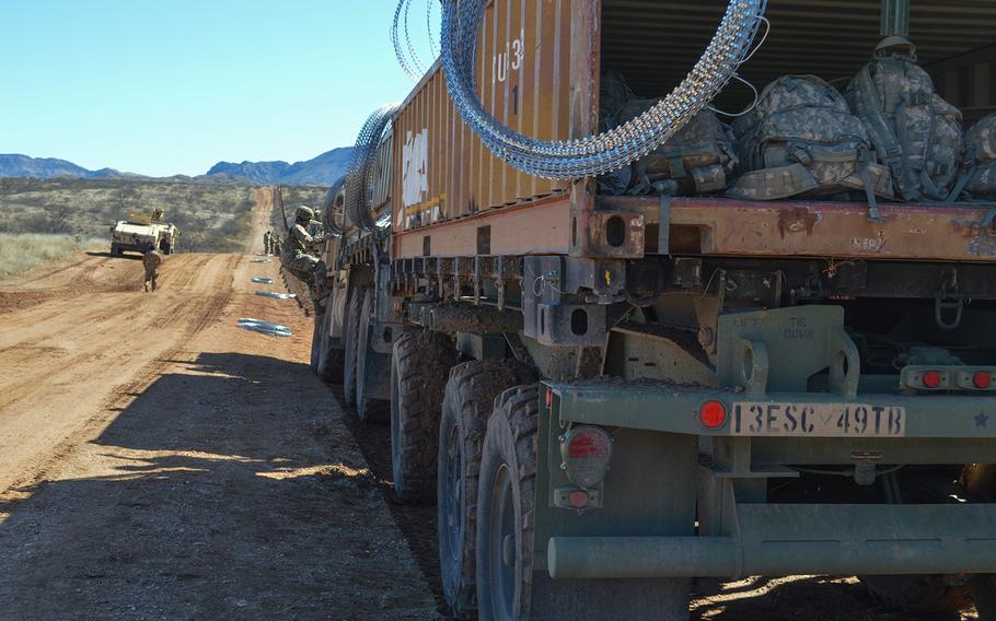 A military vehicle faces east at the border wall in Sasabe, Ariz., Feb. 7, 2019. 