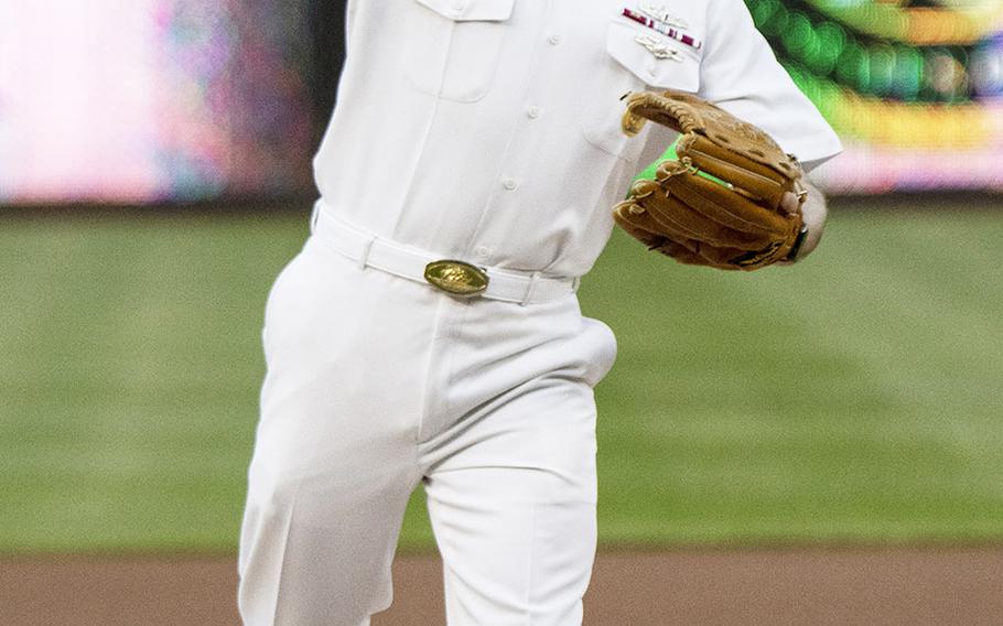 Master Chief Petty Officer of the Navy Russell Smith throws out the ceremonial first pitch during Navy Night at Nationals Park in Washington, D.C., May 1, 2019.