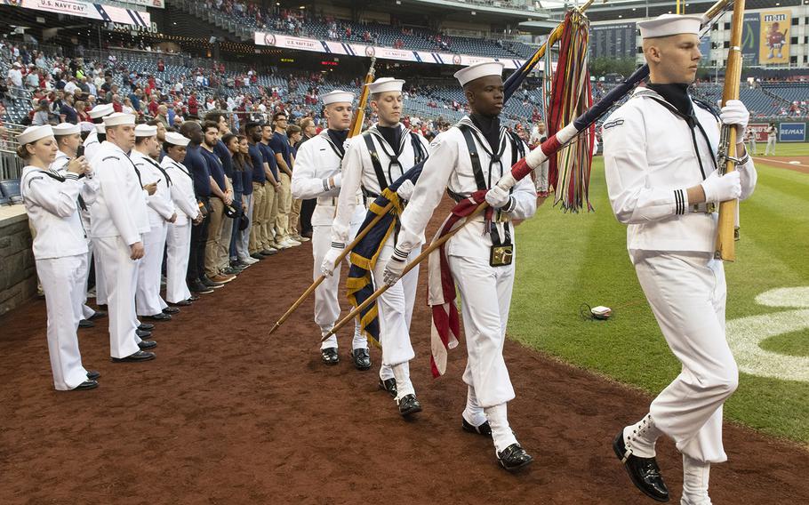 The U.S. Navy Ceremonial Guard arrives on the field during Navy Night at Nationals Park in Washington, D.C., May 1, 2019.