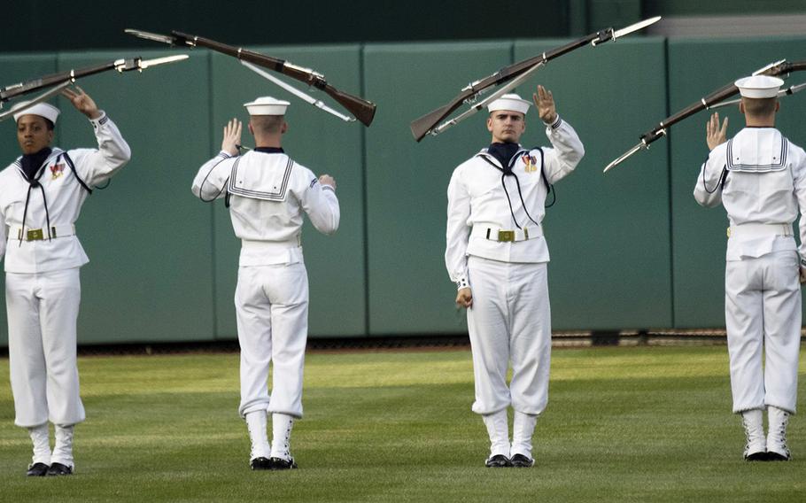 The U.S. Navy Drill Team performs in the outfield during Navy Night ceremonies at Nationals Park in Washington, D.C., May 1, 2019.