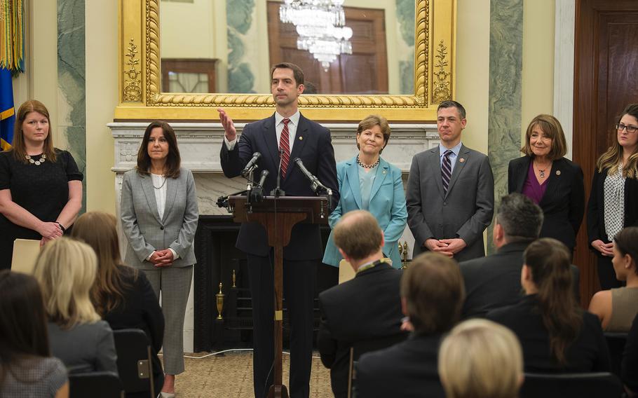Sen. Tom Cotton, R-Ark., takes questions in the Russell Senate Building on Capitol Hill in Washington on Thursday, May 9, 2019. Joining Cotton in promoting efforts to make it easier for military spouses' occupational licenses to be portable from state to state are from left: Navy spouse Andrea Krull; second lady Karen Pence, wife of Vice President Mike Pence; Sen. Jeanne Shaheen, D-N.H; Rep. Jim Banks, R-Ind; Rep. Susan Davis, D-Calif; and Air Force spouse Brittany Boccher. 