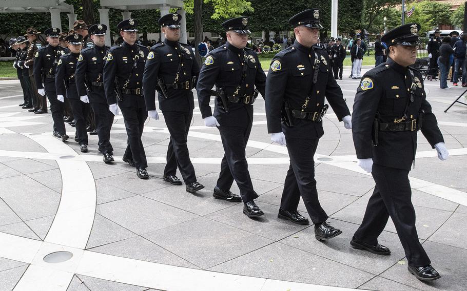 The Pomona, Calif., police honor guard marches during National Police Week at the National Law Enforcement Officers Memorial in Washington, D.C., May 14, 2019.
