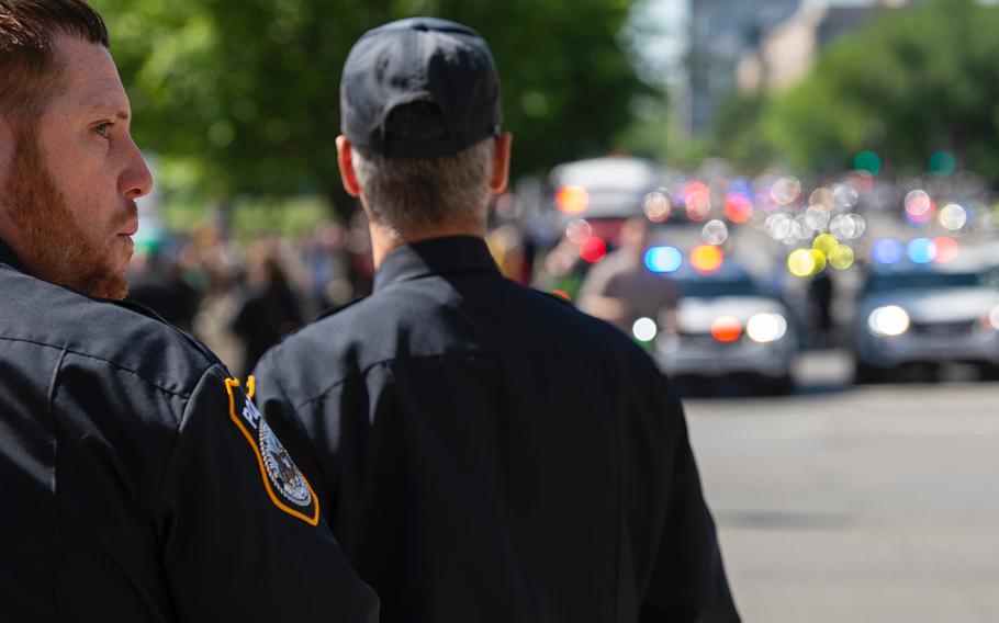 Police officers and vehicles line the streets around the U.S. Capitol in Washington on Wednesday, May, 15, 2019, as thousands gathered for a memorial service to honor law enforcement personnel who have fallen in the line of duty.