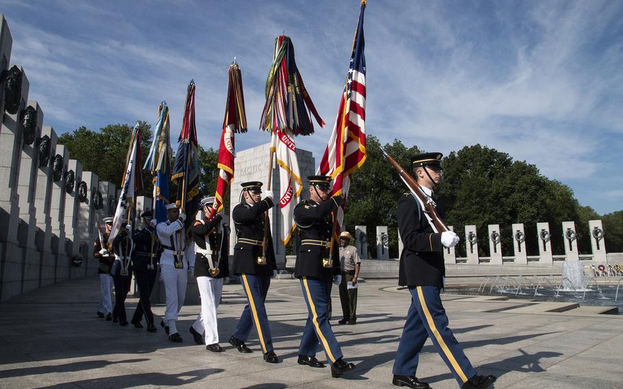 The Armed Forces Color Guard of the Military District of Washington, on Memorial Day at the National World War II Memorial in Washington, D.C., May 27, 2019.