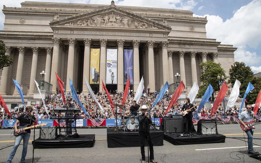 Singer Justin Moore performs in front of the National Archives before the National Memorial Day Parade in Washington, D.C., May 27, 2019.