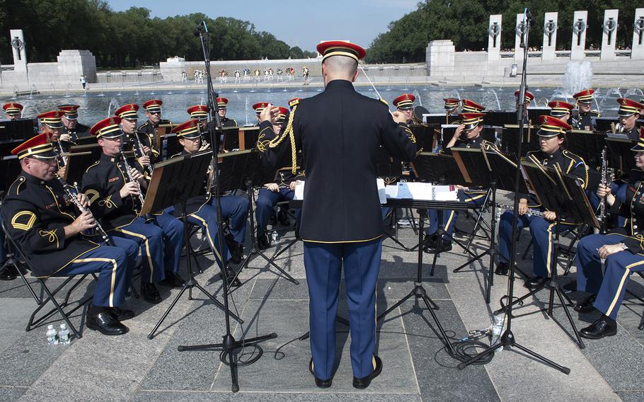 The U.S. Army Band ("Pershing's Own") plays at a ceremony marking the 75th anniversary of D-Day, June 6, 2019 at the National World War II Memorial in Washington, D.C.