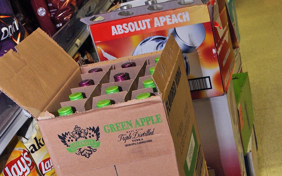 Cases of distilled spirits are packed away at the Camp America mini mart in order to be shipped to the main Navy Exchange at U.S. Naval Station Guantanamo Bay, Cuba Aug. 27, 2013.