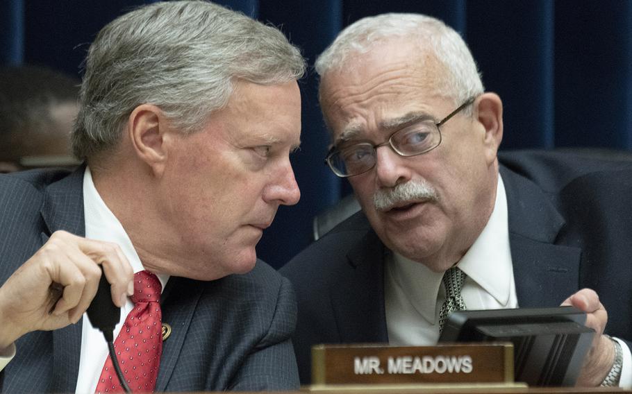 Rep. Gerry Connolly, D-Va., right, chairman of the House Committee on Oversight and Reform's Government Operations subcommittee, confers with Ranking Member Rep. Mark Meadows, R-N.C., during a hearing on Capitol Hill, June 20, 2019.