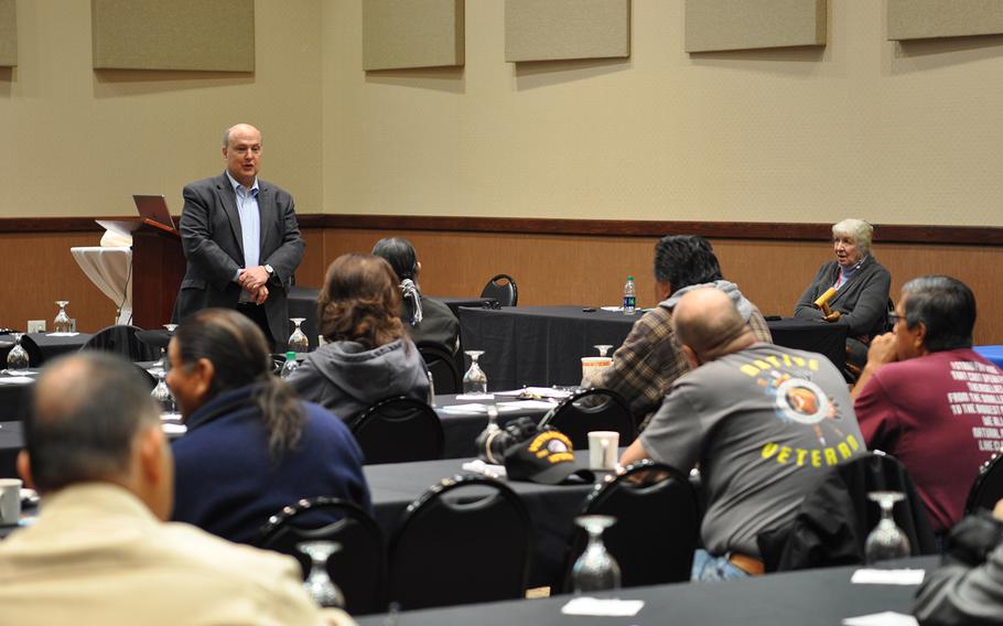 Paul Sullivan, who works in veteran outreach for the law firm Bergmann & Moore, addresses a group of veterans at the Ohkay Hotel Casino in Okay Owingeh, N.M., on Tuesday, Nov. 6, 2018. Sullivan and attorney Carol Wild Scott held a two-day workshop to educate Native American veterans about getting connected to VA benefits.