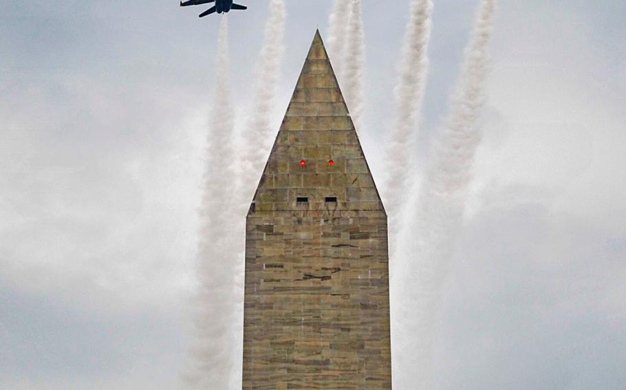 The U.S. Navy flight demonstration squadron, the Blue Angels, fly over the Washington Monument during a Fourth of July celebration in Washington, D.C., July 4, 2019.