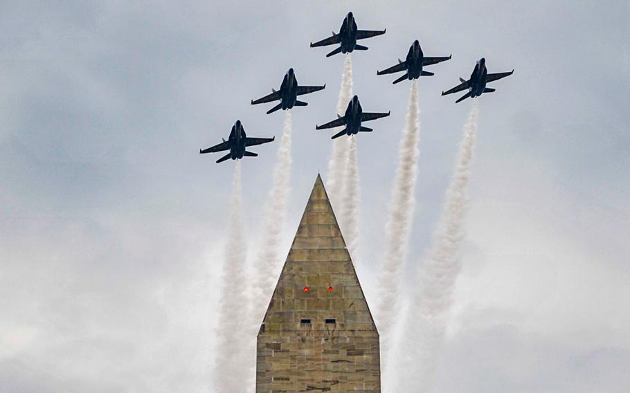 The U.S. Navy flight demonstration squadron, the Blue Angels, fly over the Washington Monument during a Fourth of July celebration in Washington, D.C., July 4, 2019. 