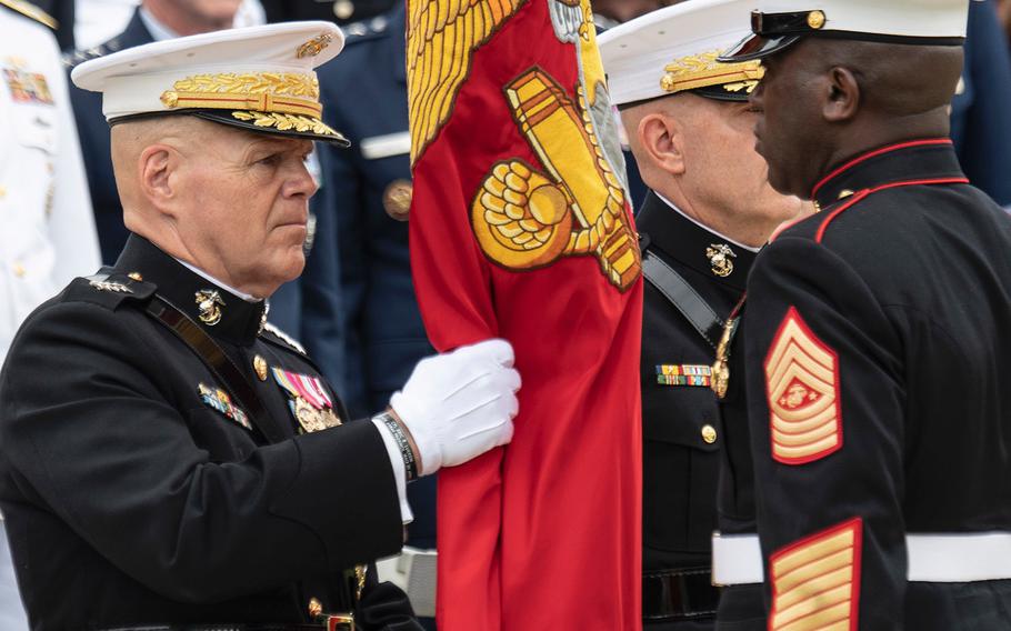Retiring United States Marine Corps Commandant Gen. Robert Neller, left, receives the Marine colors from Sergeant Major of the Marine Corps Ronald L. Green during a passage of command ceremony at Marine Barracks Washington, D.C., July 11, 2019. Gen. David Berger, behind Green, became the 38th Commandant of the Corps. In his remarks, Neller talked about the path forward for the Marine Corps, which he said has already made great improvements since he joined in 1975. “We’ve got to get ready for the next fight, which is going to be very, very different,” he said. “It’s going to be against someone who is certainly, in many ways, as capable if not more capable than us. Our course of action is not hope, it’s to be prepared.”
