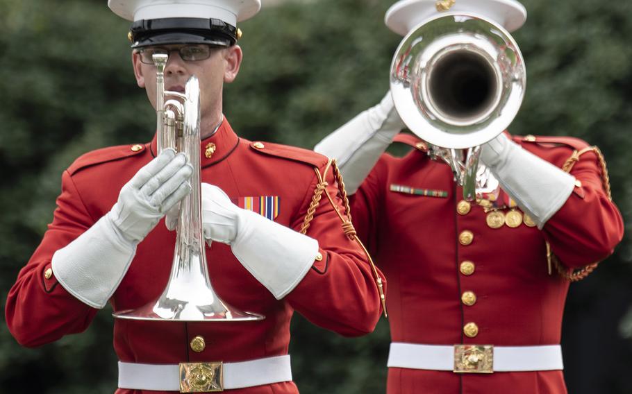 Members of the United States Marine Band perform at the passage of command ceremony at the Marine Barracks Washington, D.C., July 11, 2019. Gen. David H. Berger became the 38th Commandant of the United States Marine Corps, replacing retiring Gen. Robert Neller.