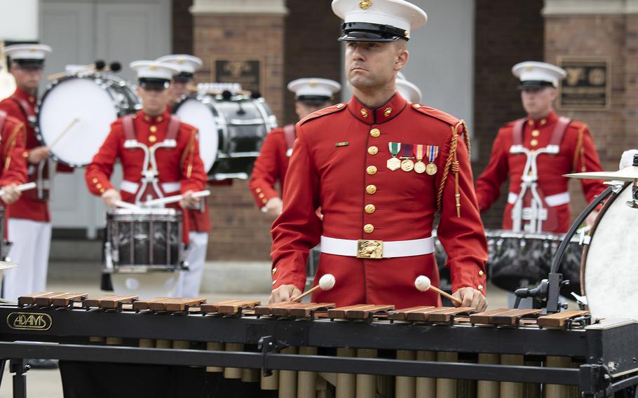 Members of the United States Marine Band perform at the passage of command ceremony at the Marine Barracks Washington, D.C., July 11, 2019. Gen. David H. Berger became the 38th Commandant of the United States Marine Corps, replacing retiring Gen. Robert Neller.
