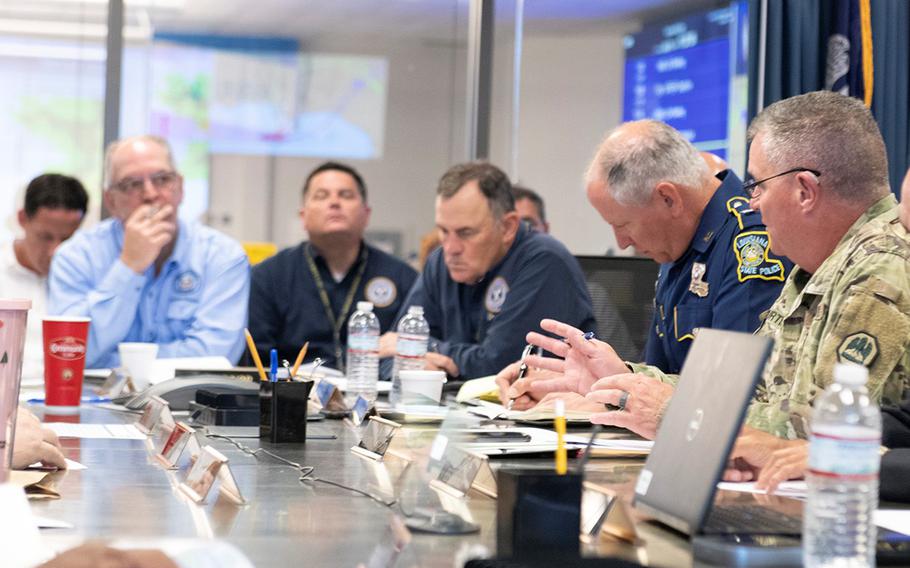 Maj. Gen. Glenn H. Curtis, adjutant general of the Louisiana National Guard, briefs Gov. John Bel Edwards on the Guard’s activation in support of Tropical Storm Barry during a Unified Command Group meeting, July 11, 2019, at the Governor’s Office of Homeland Security and Emergency Preparedness, Baton Rouge, La.