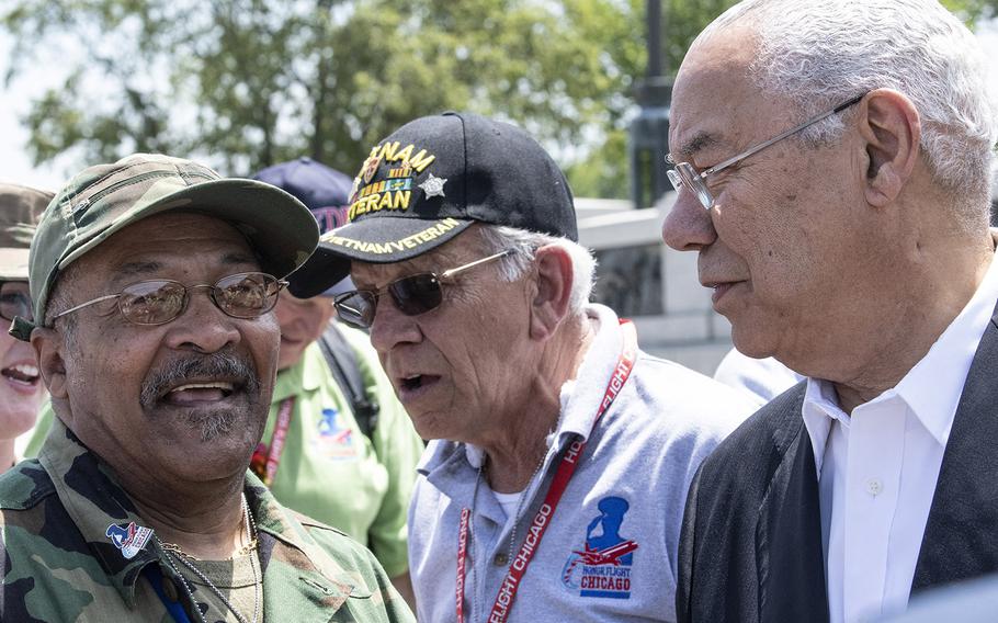 Veterans meet and take pictures with former Secretary of State Colin Powell at the National World War II Memorial in Washington, D.C. on Wednesday, July 10, 2019. The veterans visited the nation's capital as part of Honor Flight Chicago, a nonprofit that flies vets out for a one-day trip.