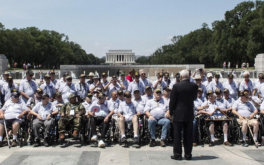 Veterans listen to former Secretary of State Colin Powell speak at the National World War II Memorial in Washington, D.C. on Wednesday, July 10, 2019.
