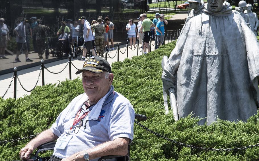 Earl Nordmyer, a Korean War veteran, poses for a photo in front of the Korean War Veterans Memorial in Washington, D.C. on Wednesday, July 10, 2019. 
