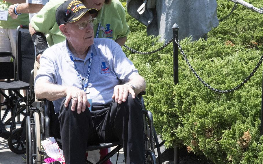 A Korean War veteran and his guardian from Honor Flight Chicago visit the Korean War Veterans Memorial in Washington, D.C. on Wednesday, July 10, 2019.
