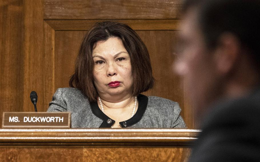 Sen. Tammy Duckworth, D-Ill., listens as Secretary of the Army Mark Esper speaks at a Senate Armed Services Committee hearing on his nomination to serve as secretary of defense, July 16, 2019 on Capitol Hill.