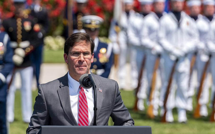 Defense Secretary Mark Esper, who was sworn into office this week, speaks during a ceremony in his honor on the Pentagon parade field Thursday.