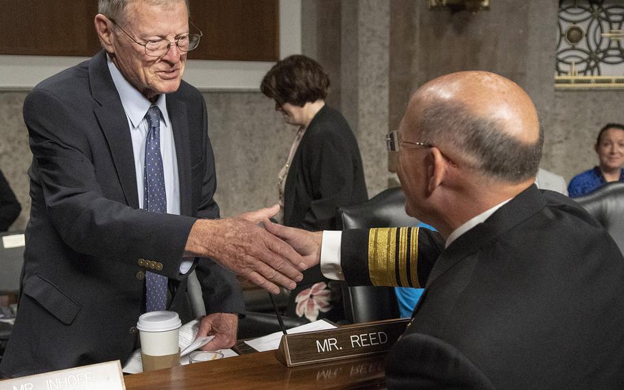 Vice Adm. Michael M. Gilday shakes hands with Senate Armed Services Committee Chairman Sen. James Inhofe, R-Okla., before a hearing on Gilday's nomination to serve as Chief of Naval Operations, July 31, 2019 on Capitol Hill.