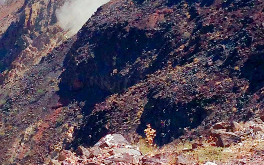 This photo provided by Panamint Springs Resort shows where a Navy fighter jet crashed Wednesday, July 31, 2019, in Death Valley National Park, injuring several people who were at a scenic overlook where aviation enthusiasts routinely watch military pilots speeding low through a chasm dubbed Star Wars Canyon, officials said. 