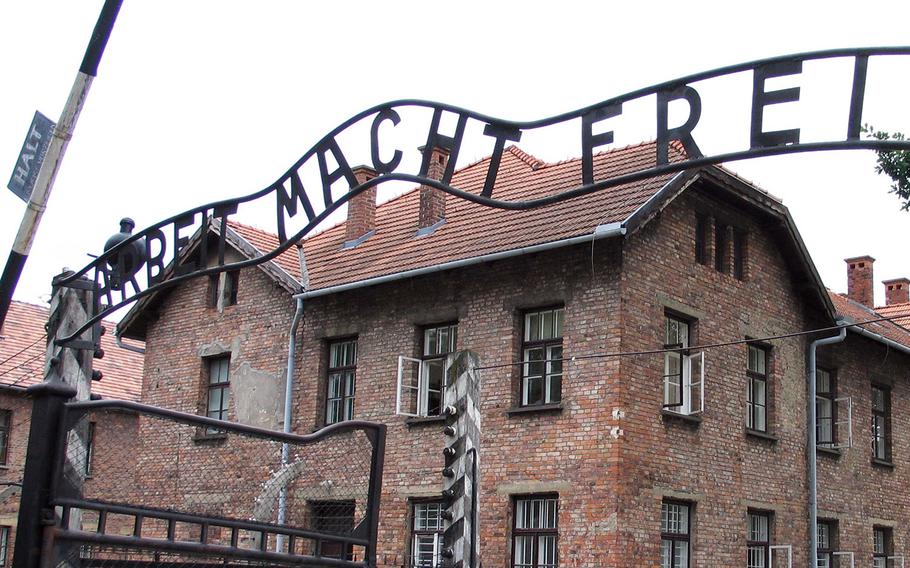 The infamous sign at the gate of the Auschwitz prison camp in Poland saying "Arbeit Macht Frei."