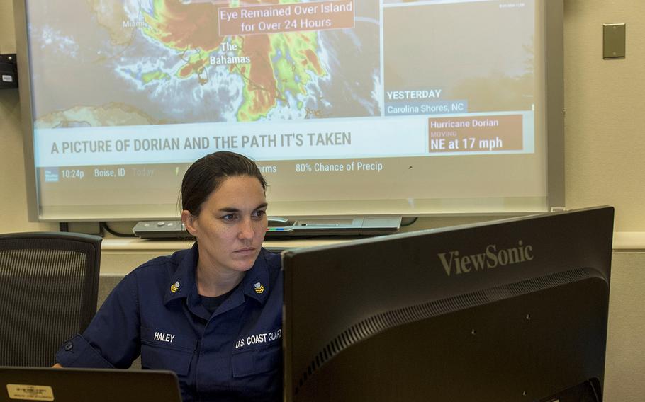 Coast Guard members at Coast Guard Headquarters in Washington D.C., ensure deployed incident management teams and Bahamian humanitarian operations receive the requested personnel needed to assist during Hurricane Dorian response efforts, Friday, Sept. 6, 2019.