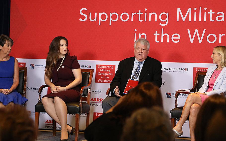 Craig Remsburg speaks about caring for his son, a wounded veteran, during a caregiver panel Tuesday at the "Supporting Military Caregivers in the Workforce" summit hosted by the Elizabeth Dole Foundation, AARP, and the U.S. Chamber of Commerce's Hiring Our Heroes foundation in Washington, D.C. 