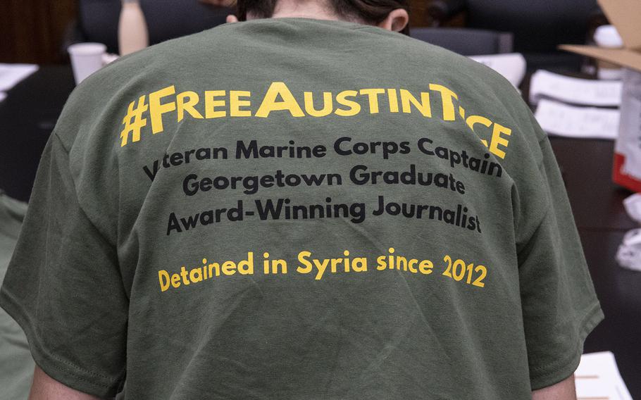 A t-shirt worn by a volunteer on Capitol Hill on Sept. 23, 2019 gives details about Austin Tice, a journalist who has been missing in Syria for seven years.