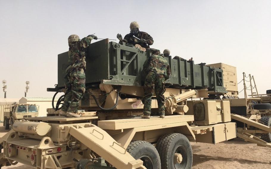 Soldiers take part in a Patriot missile reloading exercise at Camp Buehring, Kuwait, on January 16, 2018. Amid rising tensions with Iran, a Patriot missile battery will be sent to Saudi Arabia, the Pentagon says.