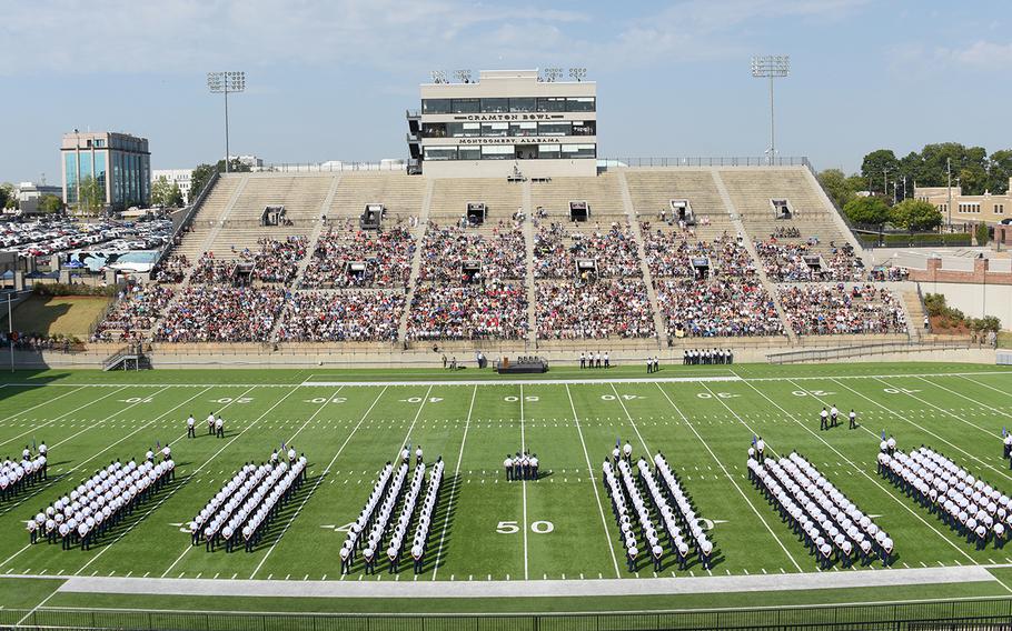 Newly minted Air Force commissioned officers stand in formation at the Cramton Bowl in Montgomery, Ala., Sept. 27, 2019. 