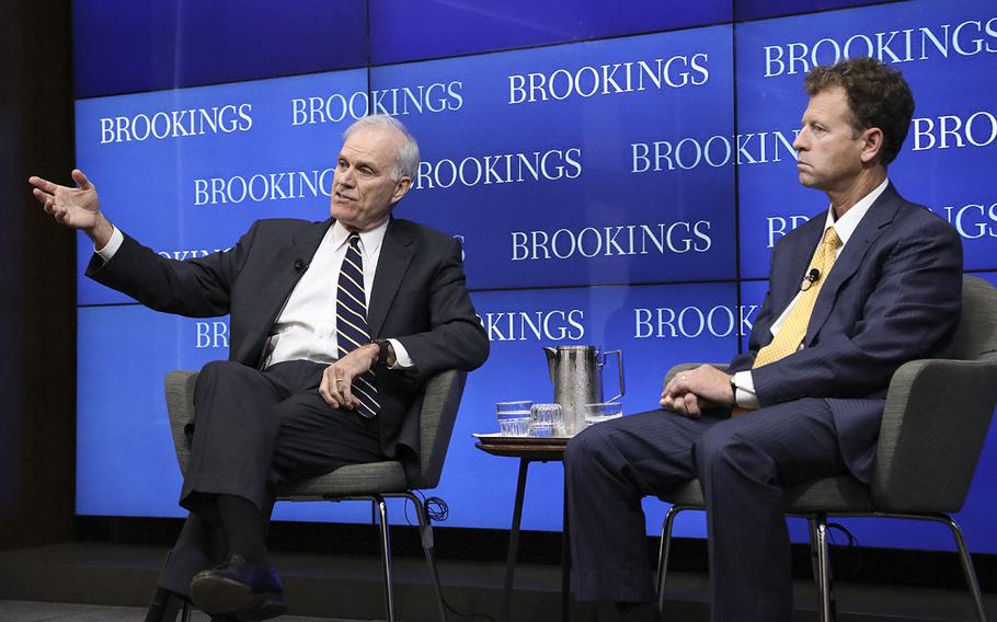 Navy Secretary Richard Spencer, left, speaks before an audience Wednesday at the Brookings Institution, a Washington think tank, for a discussion about the U.S. Navy in an era of great power competition.