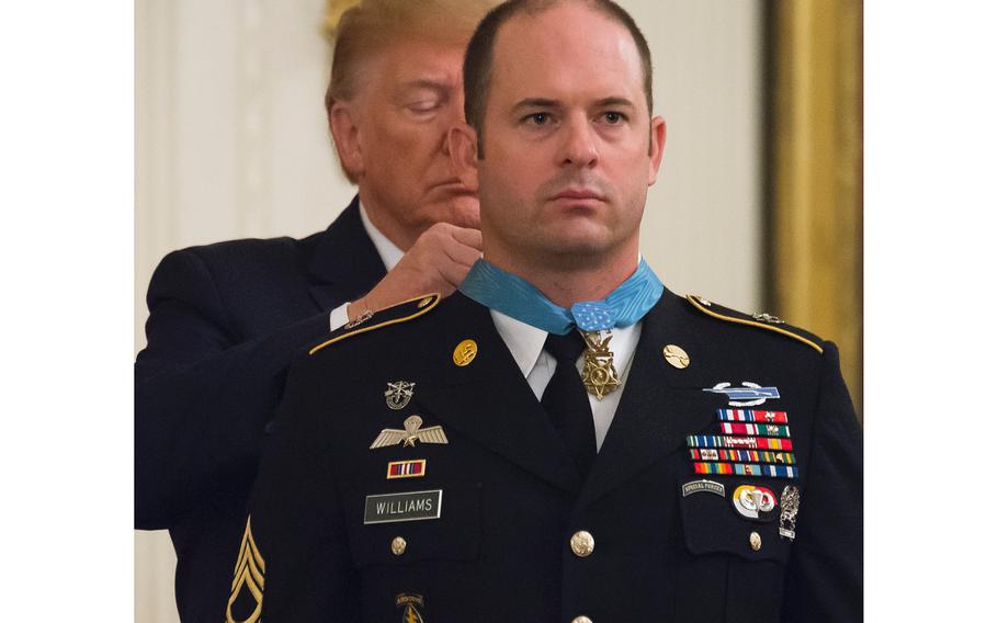 President Donald Trump awards Master Sgt. Matthew O. Williams with the Medal of Honor during a ceremony at the White House on Wednesday, Oct. 30, 2019.