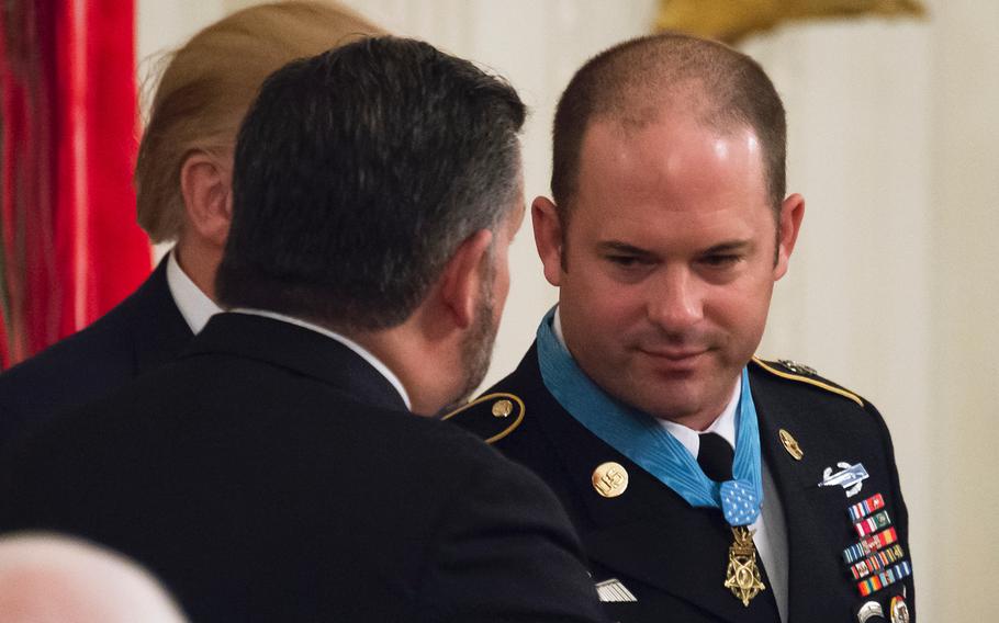 Master Sgt. Matthew Williams meets and greets Sen. Ted Cruz, R-Texas, after Williams received the Medal of Honor during a ceremony at the White House on Wednesday, Oct. 30, 2019.