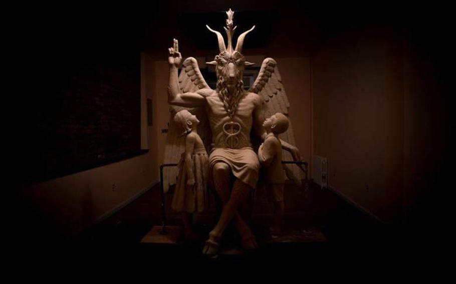 The statue of Baphomet is a bronze sculpture commissioned by The Satanic Temple depicting the goat-headed, angel-winged symbol of the occult. 