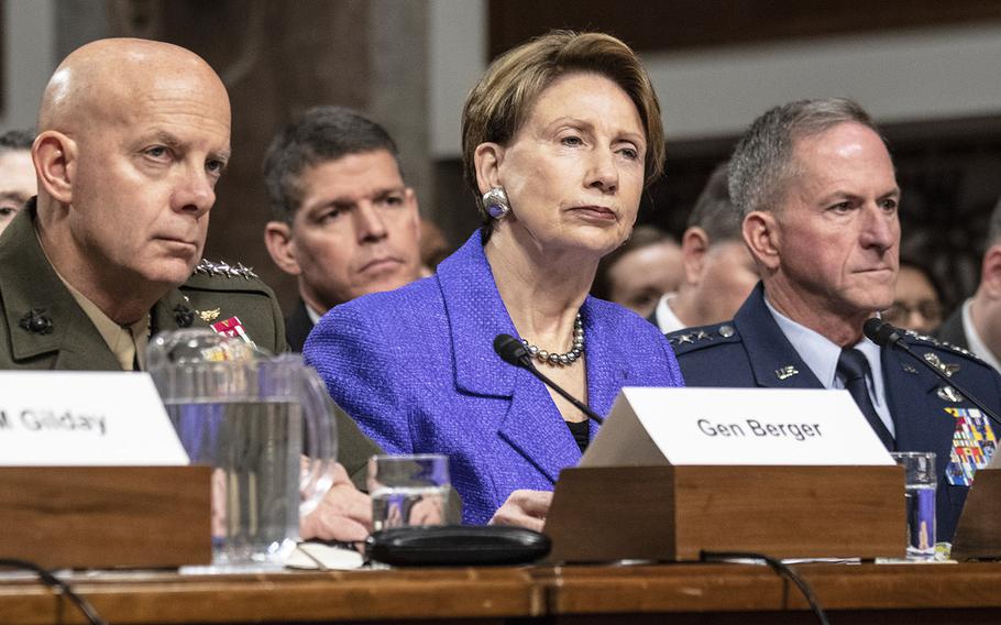 Marine Corps Commandant Gen. David H. Berger, Air Force Secretary Barbara M. Barrett and Air Force Chief of Staff Gen. David L. Goldfein, left to right, listen during a hearing on privatized military housing, December 3, 2019, on Capitol Hill.