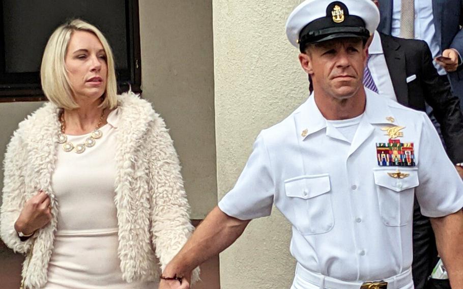 Navy SEAL Chief Edward R. Gallagher and his wife, Andrea, leave the courthouse at the during his trial in November, 2019. 