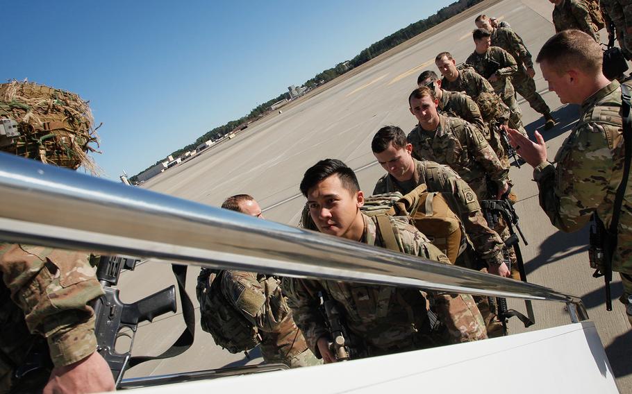 Paratroopers assigned to 1st Brigade Combat Team, 82nd Airborne Division load aircraft bound for the U.S. Central Command area of operations from Fort Bragg, N.C. on January 5, 2020. 