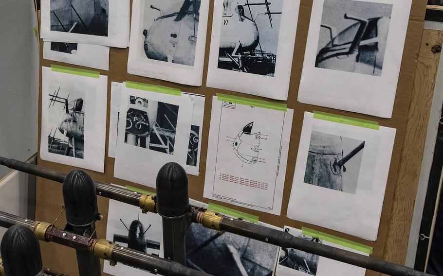 Old photos are used in the restoration of the Martin B-26B-25-MA Marauder "Flak-Bait" at the Smithsonian's Udvar-Hazy Center in January, 2020.