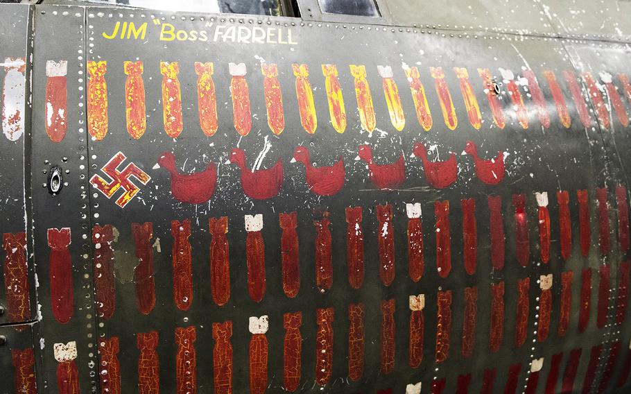 Nose art on the Martin B-26B-25-MA Marauder "Flak-Bait," being restored at the Smithsonian's Udvar-Hazy Center in January, 2020. Lt. James J. "Boss" Farrell of Greenwich, Conn., flew more missions in "Flak-Bait" than any other pilot; he named the bomber after "Flea Bait," his brother's nickname for the family dog. THe swastika represents the plane's lone confirmed kill; thed ducks represent missions where "Flak-Bait" was used as a decoy to lure the Luftwaffe away from the real target.