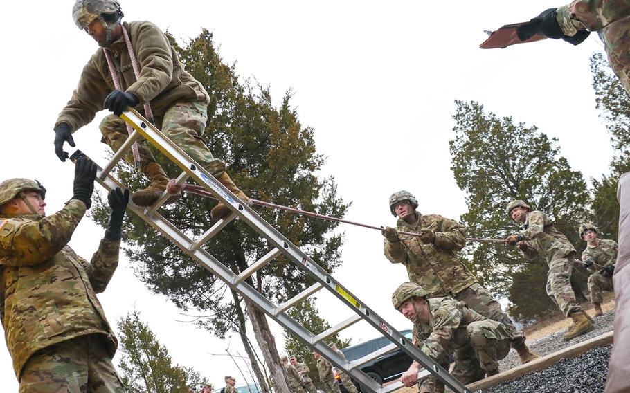 Candidates attempt to traverse an obstacle at the Leader Reaction Course during the Battalion Commander Assessment Program Jan. 23, 2020, at Fort Knox, Ky. The Battalion Commander Assessment Program is designed to determine fitness for command and potential.