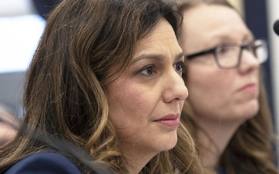 Michelle Norman, at a House Armed Services subcommittee meeting on the Exceptional Family Member Program, Feb. 5, 2020 on Capitol Hill. Next to her is military spouse Austin Carrigg.