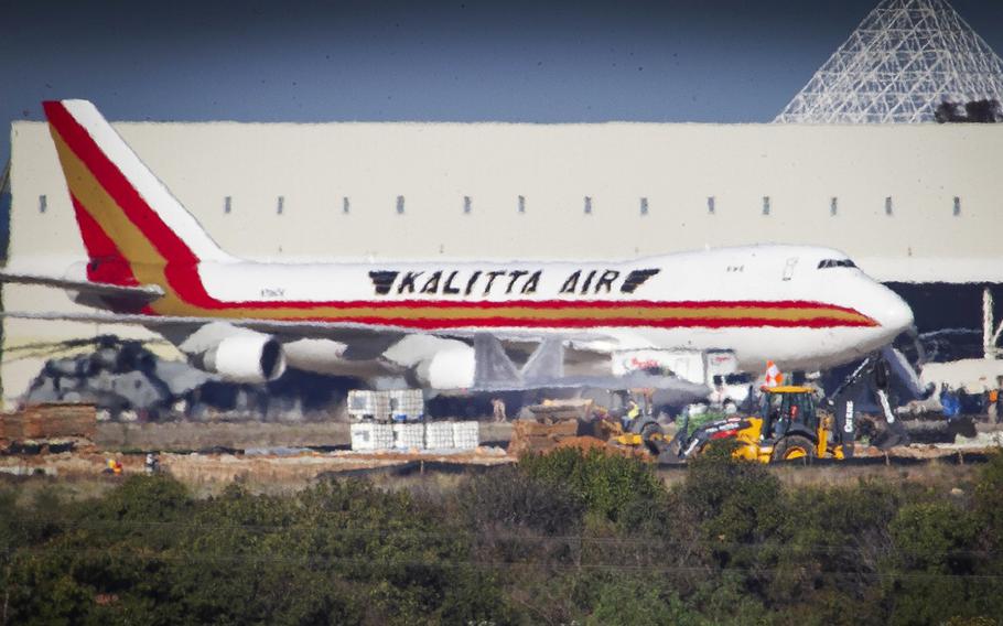 The second flight of U.S. citizens fleeing the coronavirus in China to arrive at MCAS Miramar aboard a Kalitta Air Boeing 747, is unloaded after landing, February 7, 2020 in San Diego, Calif.