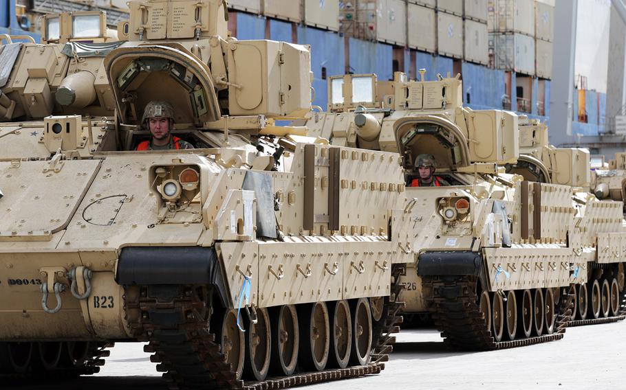 In a Feb. 7, 2020 photo, U.S. Army M2 Bradleys wait to be loaded onto American Roll-On Roll-Off Carrier Endurance in Savannah, Ga., for DEFENDER Europe-20. The Army's 2021 budget plan calls for the modernization of the Bradley and other combat vehicles.