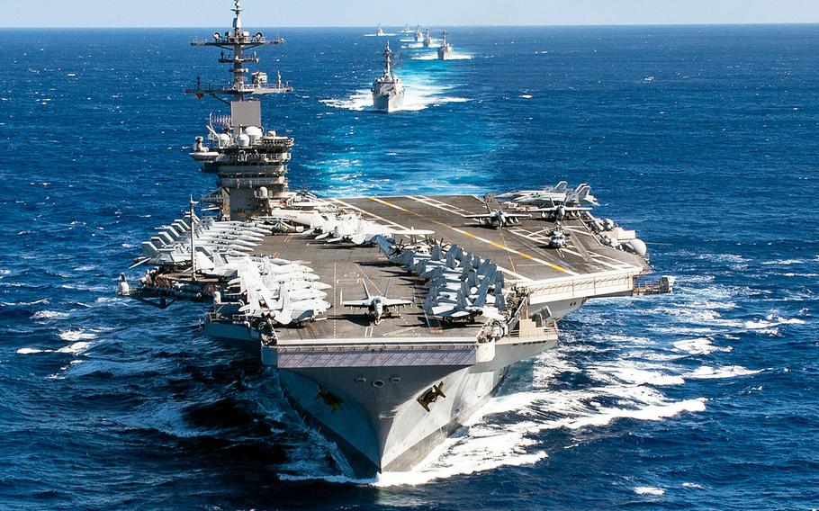 In a Jan. 25, 2020 photo, the Theodore Roosevelt Carrier Strike Group transits in formation in the Pacific Ocean.