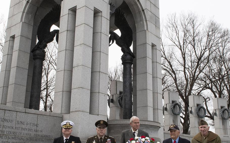 Dignitaries pose for photos after a Battle of Iwo Jima 75th anniversary ceremony, Feb. 19, 2020 at the National World War II Memorial in Washington, D.C.