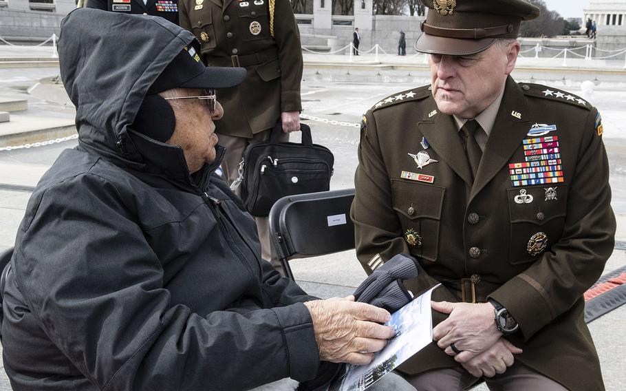 Joint Chiefs of Staff Chairman Gen. Mark Milley talks with World War II veteran Constantine Rizopoulos before an Iwo Jima 75th anniversary ceremony, Feb. 19, 2020 at the National World War II Memorial in Washington, D.C.